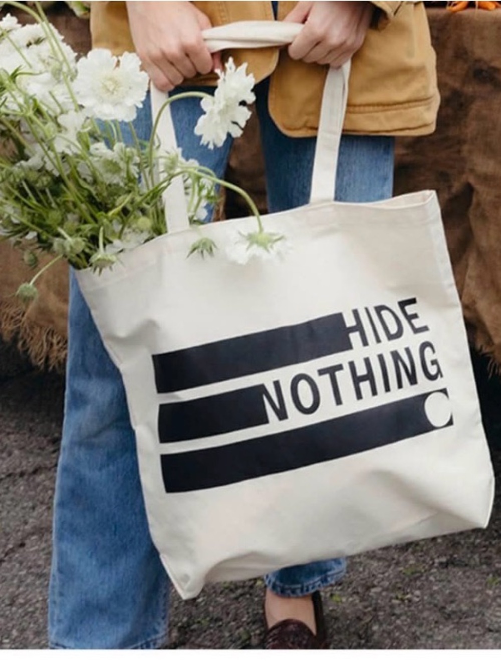 Cream Canvas Tote Bag with Black "HIDE NOTHING" Print